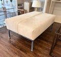 Upholstered Champagne Hide cocktail ottoman